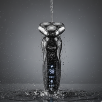 Fayd Pro electric shaver being rinsed under water to demonstrate waterproof design